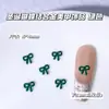 Las Decoraciones para Uñas de Aleación con Temática Navideña Son un Éxito de Ventas Transfronterizo, Incluyendo Rojo Ancla, Verde Navidad, Calcetines Lindos y Decoraciones de Uñas de Bastón