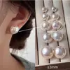 Polvo para Bollos al Vapor Shijia Aretes Perla Blanca Leche Ligera para Mujer Aguja de Plata de Ley S925 Nicho de Gama Alta Versátiles Nuevos Aretes