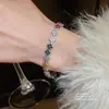 Pulsera con Hebilla de Flor Geométrica de Zirconia de Colores de Cuatro Pétalos Pulsera de Lujo Ligero con Sentido de Gama Alta Joyería de Mano Coreana de Nicho para Mujeres