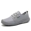 Zapatos casuales de mujer de malla de punta redonda, zapatos de malla con cordones frontales, absorción de impactos, tacón plano, zapatos de mujer, venta al por mayor de fábrica