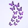 Mariposa hueca 3D púrpura brillante mariposa de metal de imitación pegatinas de pared decoración de pared sala de estar pegatinas de diseño de pared