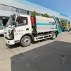 Camión de basura híbrido enchufable con caja de carga sellada de alta resistencia, cero emisiones, para la recolección y compactación de residuos domésticos en áreas escénicas y calles urbanas