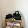 Bolso de Mano de Diseño de Moda de Nicho para Mujer 2026 Nuevo Estilo Coreano Bolso Cubo para Viajes Diarios Bolso de Hombro Único Cruzado Transfronterizo