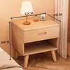 Mesita de noche de madera maciza para dormitorio del hogar 2026 Venta caliente Creativa Pequeño Armario de almacenamiento simple para niños Mesita de noche de tronco
