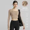 Novidade Outono e Inverno 2026 Roupas de Yoga Femininas Tops Esportivos com Bojo para Corrida ao Ar Livre Pilates Fitness Tops Femininos de Manga Longa