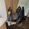 Bolsa de ombro transversal com textura de moda retrô, grande capacidade, novo design de nicho Outono/Inverno 2026, bolsa para o dia a dia, bolsa de bolinho