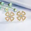 Brincos Femininos Elegantes de Luxo Leve Estilo Coreano Trevo de Quatro Folhas da Sorte Brincos de Moinho Microcravejados Brincos Vazados Brincos