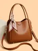 Bolsa de Mão de Luxo para Mulheres 2026 Nova Bolsa de Balde de Nicho Versátil para Trabalho e Deslocamento Bolsa de Ombro Único Transversal Bolsa Feminina Tendência