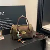 Bolsa de ombro feminina de nicho super popular transfronteiriça, nova moda de verão 2026, bolsa transversal moderna de alta qualidade, bolsa almofada requintada