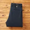 Pantalones largos de mezcla de algodón peinado de alta gama, engrosados y cepillados, nuevos para 2026, otoño/invierno, casual de negocios, corte holgado, pierna recta para hombre