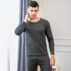 Traje de ropa interior térmica de terciopelo dorado para hombre con forro polar engrosado a prueba de frío ropa de otoño para parejas pantalones largos ropa cálida para mujer talla grande