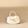 Bolsas de Nicho de Alta Gama Estilo Coreano Transfronteiriças para Mulheres, Nova Bolsa Almofada Bowling, Bolsa de Ombro Transversal Versátil