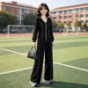 Conjunto esportivo feminino de duas peças para primavera e outono: moletom com zíper e capuz, mangas com punho e calça longa casual de perna larga, atacado para vendas transfronteiriças