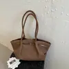 Bolsa Saco Versátil Simples de Luxo Feminina 2026 Outono Inicial Nova Tendência Estilo Coreano Exquisite Elegante Bolsinha de Mão Ombro