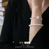 Pulseira de Pérolas Camélia Gota de Óleo Retrô Francês Versátil Pulseira de Luxo Leve Temperamento Joias de Moda de Alta Qualidade Atacado