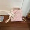 Mochila estrellada de moda estilo coreano para mujer, nuevo modelo principios de otoño 2026, gran capacidad, bolso de hombro y cruzado único y elegante