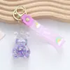 Agite o som do pingente de joia pequena da moda, doce pirulito bolhas de sabão na garrafa de areia movediça flutuante chaveiro atacado