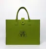 Bolsas de fieltro personalizadas para el Festival de Medio Otoño para eventos festivos, reuniones anuales corporativas, bolsas de fieltro lindas al por mayor, bolsas para bebés de mes completo y de un año