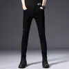 Jeans pretos de alta qualidade de Hong Kong para homens, novos para primavera/verão, corte slim, com stretch, versáteis para business casual, calças compridas