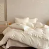 Juego de ropa de cama de cuatro piezas con ribete de encaje de lujo ligero, con una paleta de colores suave y cremosa, hecho de algodón lavable y amigable con la piel, e incluye un juego de tres piezas para dormitorio