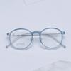 Armazón de gafas de titanio puro 6g al por mayor redondo TR90 tamaño pequeño armazón de gafas con chapado IP armazón de titanio transparente libro rojo pequeño 9882