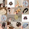 Pinzas para el Cabello de Leopardo en Liquidación al por Mayor Estilo Coreano Felpa Pequeños Artículos de Yiwu Gomas para el Cabello Pinzas con Lazos a Cuadros Accesorios para el Cabello