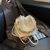 Bolsa feminina estilo coreano inspirada na Chanel 2026 nova moda bolsa transversal com corrente texturizada bolsa bucket bolsa de ombro casual para mulheres