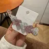 Pinza para el cabello coreana de lujo ligero con brillo de diamante en forma de corazón y degradado, pinza de plátano, clip para coleta alta en la parte posterior de la cabeza con temperamento dulce, pinza retorcida femenina