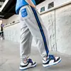 Z770 verano principios Yang niños 2024 Verano nuevo niños medianos y grandes frescos delgados deportes moda moda cinta pantalones atados al tobillo