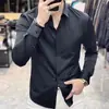 Camisa de marca francesa de alta gama con botones ocultos para hombre, corte slim fit, estilo business casual, resistente a las arrugas, camisa blanca de manga larga, nuevo modelo de primavera