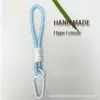 Cordão Chaveiro para Celular Tecido à Mão Feminino de Alta Qualidade Pulso Corrente Antifurto Corda de Celular Pingente de Boneca