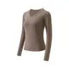 Camiseta lisa de venta directa de fábrica para mujer, hombro normal, cuello en V, corte ajustado, adelgazante, manga larga, nuevo top básico versátil para primavera/otoño