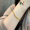 Nuevo Collar de Trébol de Cuatro Hojas Clásico Color Dorado Arena para Mujer Diseño de Nicho de Moda Simple Versátil Cadena para Clavícula Joyería al por Mayor