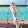 Traje de baño sexy para mujer estilo coreano Nuevo bikini de moda Vestido largo de malla Bikini transparente de un solo hombro de color sólido