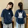 Nueva camiseta de estilo coreano para niñas, imitación de dos piezas, manga larga, camiseta básica de algodón puro para otoño, top versátil y elegante a la moda para niñas