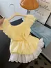 Camisa Amarilla de Encaje Manga Corta con Lazo para Mujer Petite 2026 Verano Súper Caliente Camisa Reductora de Edad
