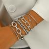 Pulsera de cadena en forma de O con giro creativo de estilo metálico exagerado para mujer, pulsera con diseño vintage de nicho que combina con todo.