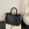 Bolso de mano elegante y versátil para mujer, nuevo diseño moderno 2026, adecuado para ir al trabajo, se puede llevar en la mano o usar como bolso de hombro o bolso cruzado