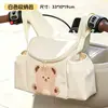 Nueva bolsa de almacenamiento para vehículos eléctricos, adecuada para triciclos y cochecitos de bebé, con gran capacidad y un bolsillo frontal para guardar artículos y teléfonos.
