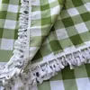 Toalha de mesa xadrez com franjas, popular no comércio exterior, feita de algodão e linho naturais, oferece um toque de luxo leve e de alta qualidade, cria uma atmosfera aconchegante e é à prova d'água e resistente a óleo