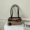 Moda elegante e simples 2026 nova bolsa de ombro feminina de outono, grande capacidade, versátil, nicho, para o trabalho