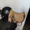 Bolso Cuadrado Pequeño de Lujo Ligero Transfronterizo, Bolso Cruzado de Alta Gama y Exquisito, Bolso de Hombro Portátil, Bolso de Media Luna Femenino de Diseño de Nicho para Verano