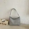 Bolso Femenino para Axila 2026 Nuevo de Moda Verano Lujo Ligero Nicho Patrón Tejido Bolso de Hombro para Viajes Diarios Cruzado Bolso Cubo