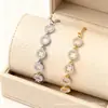 Cdd Nuevo Cobre Incrustado Circonio Lujo Accesible Gama Alta Calado Trébol de Cuatro Hojas Elegante Pulsera Ajustable Deslizante Fábrica de Origen