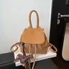 Mochila feminina versátil retrô transfronteiriça 2026 nova mochila versátil para o dia a dia com um pequeno fichário de estilo coreano refinado
