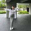 Saia Midi de Malha para Gestante Sem Cós Primavera Outono Roupa Externa 2026 Nova Slimming Corte Reto Abraça o Quadril Saia Base Feminina Verão
