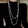 Collar Largo Retráctil Lujo Ligero Nicho Nuevo Diseño 2025 Sentido de Diseño Cadena de Clavícula de Gama Alta Gargantilla Cadena de Suéter de Moda Mujer