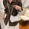 Nova Bolsa Trendy de Ombro Único para Axila Estilo Chinês para Mulheres 2026 Nova Bolsa Transversal da Moda para Trabalho e Deslocamento Pequena Bolsa de Mão
