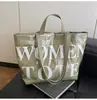 Bolso Tote Transfronterizo 2026 Estilo Nuevo para Mujer, Diseño de Letras de Alta Gama, Gran Capacidad, Estilo para Viajes Diarios, Bolso de Hombro y de Mano Personalizado
