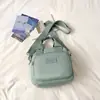 Bolso nuevo para mujer Shuai Mi Jia, bolso de mano, bolso de hombro casual, bolso cruzado de moda, bolso casual para mamá, bolso cuadrado pequeño